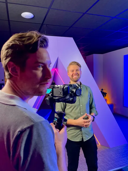 Filming a video with a gimbal camera in the Adway office