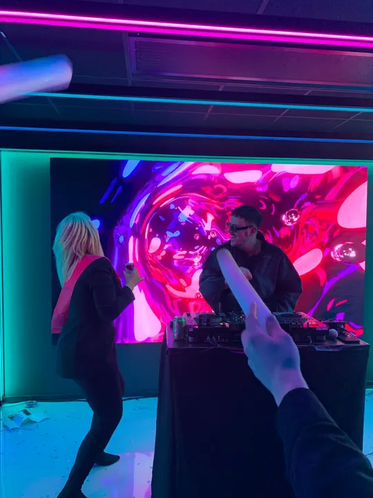 Dancing in front of the DJ booth at an Adway party