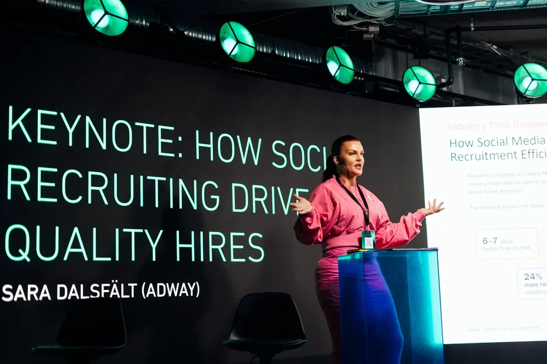 Adway speaker delivering a keynote on stage about social recruiting